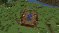 An example of an in-ground rustic hot tub (Image via Minecraft)